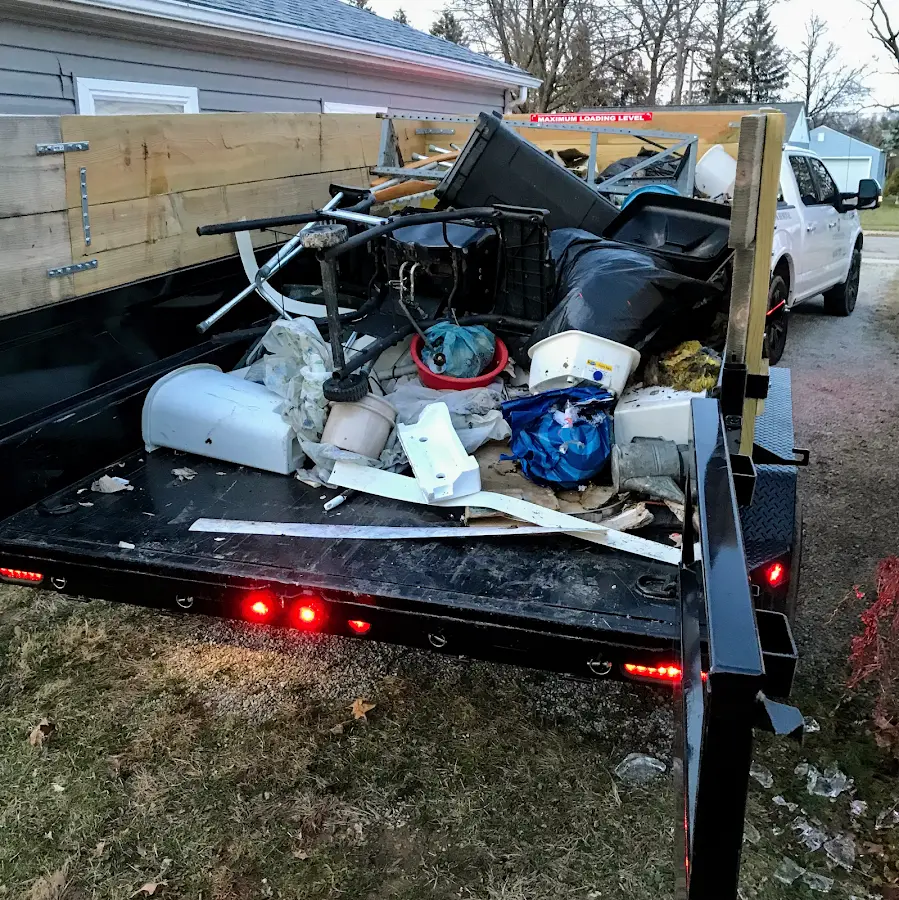 Roll-off dumpster delivered to a residential driveway in Woodlawn